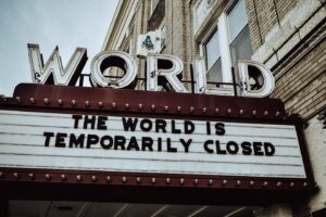 A sign "The world is temporarily closed"